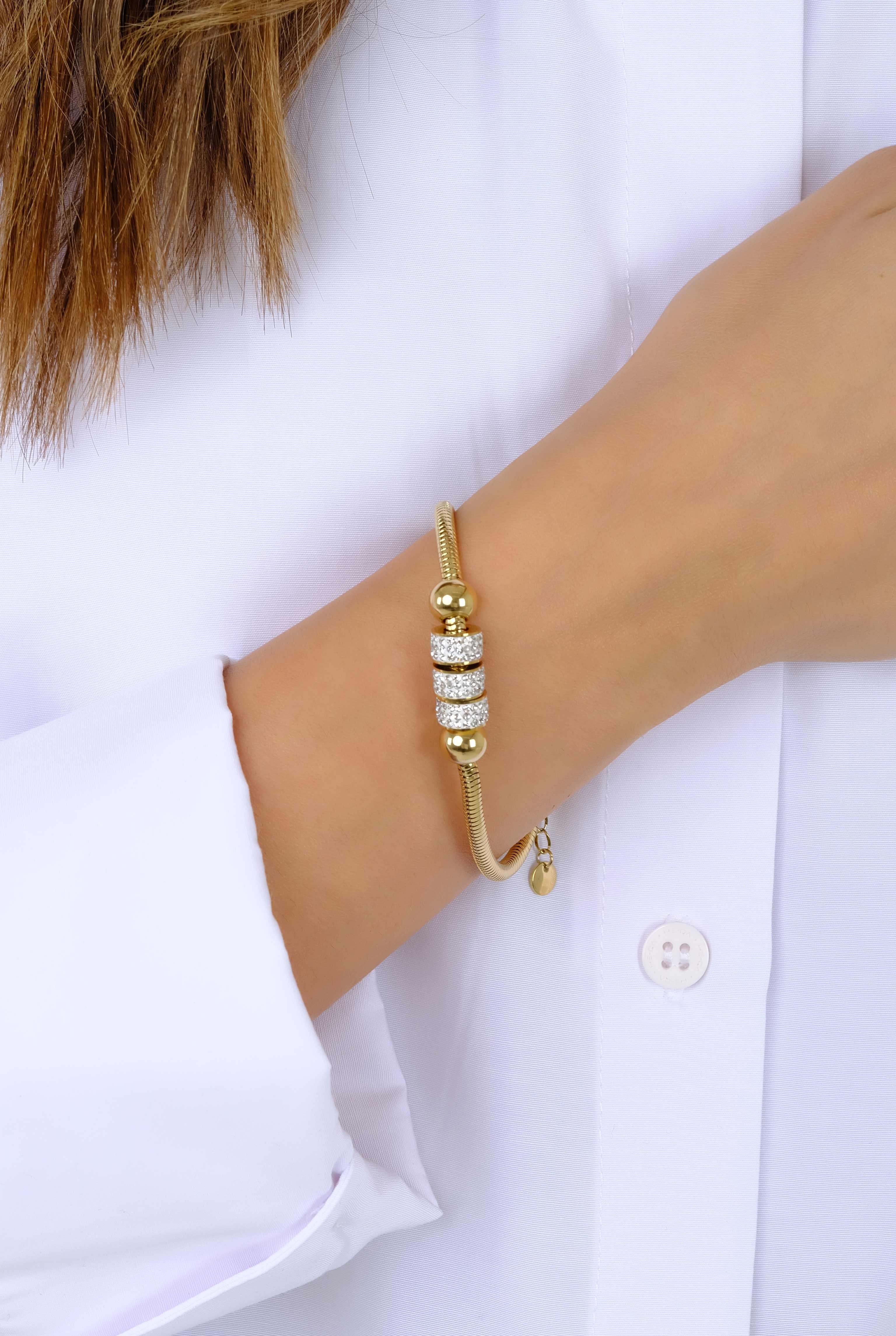 Gold Bracelet With Ringed Stone